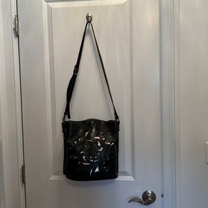 Black leather Patricia Nash shoulder bag with 18”adjustable strap